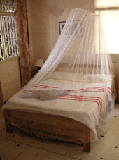cama con mosquitera